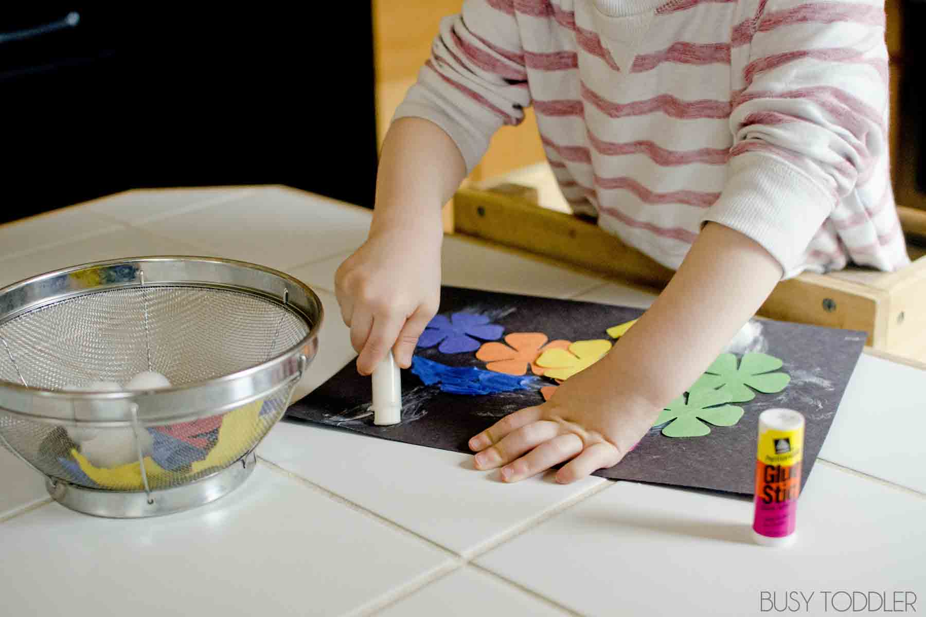 How do kids creatively use glue to elevate their art projects?