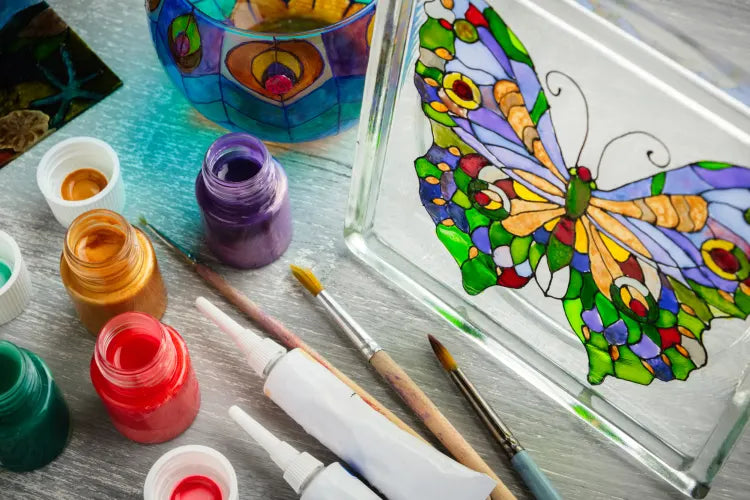 How do students use glass paints in school art projects?